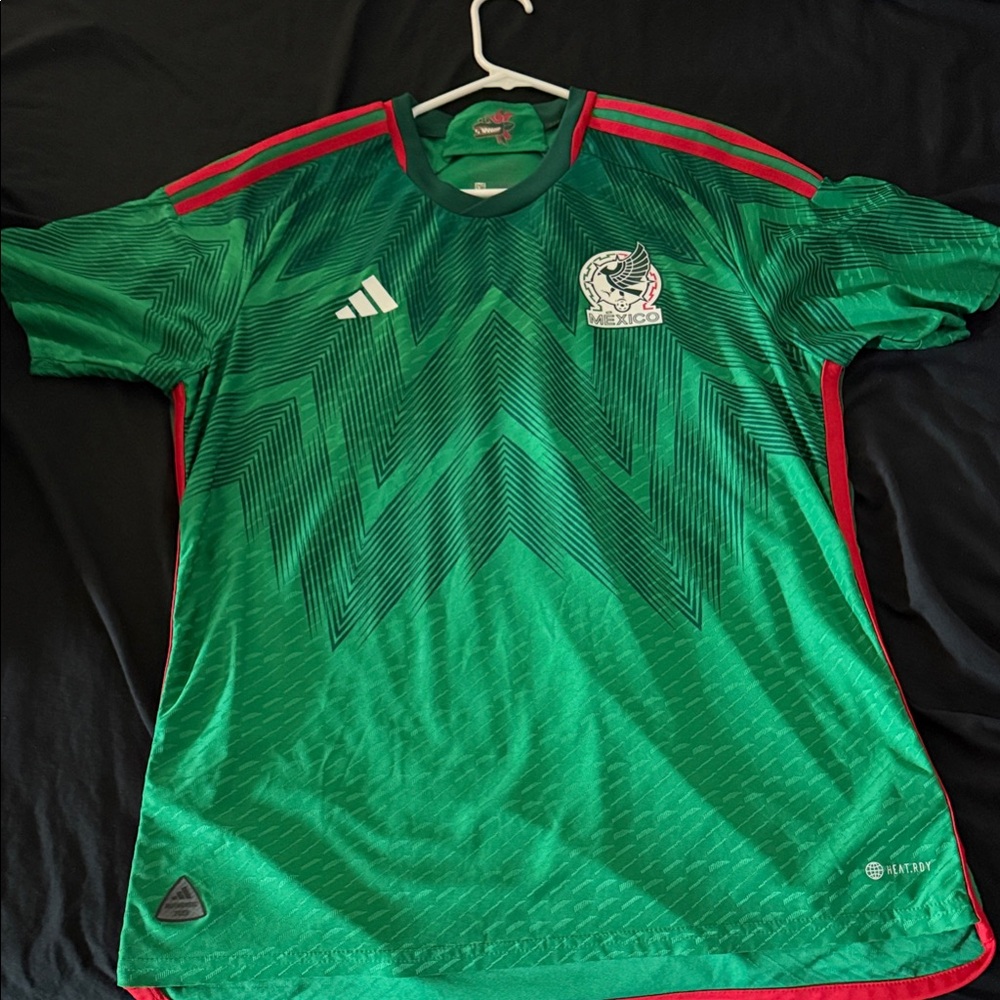 Green Soccer Jersey with Red Accents